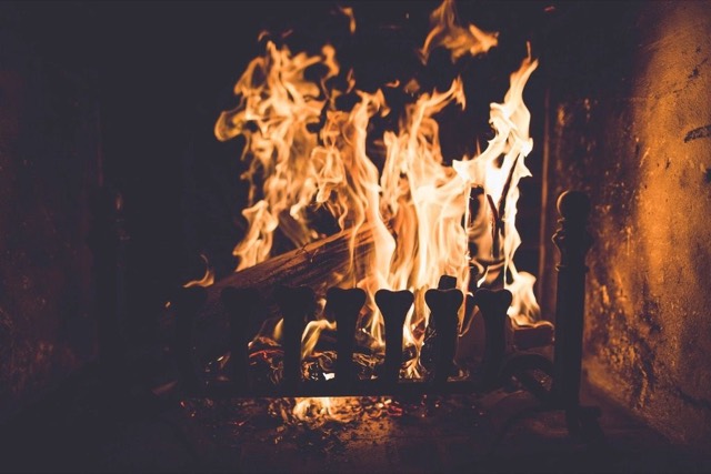 Living-room fireplace with a masonry surround — Fireplace Repair in Pompano Beach, FL